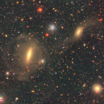 July 2019: galaxy-galaxy interactions often create tidal streams. They are often tails (curves streams). In rare cases, they can be a circle as seen here. This galaxy looks like a wrist watch.